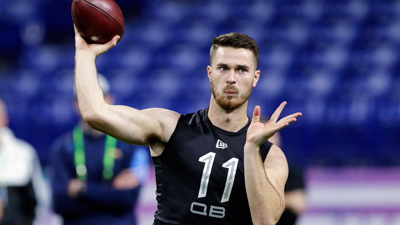 In this Feb. 27, 2020 photo, Oregon State quarterback Jake Luton throws a pass at the NFL scouting combine in Indianapolis. (Michael Conroy/AP)