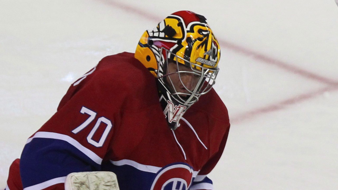 Montreal Canadians goalie Michael McNiven stops tipped shot during third period action at the 2015 NHL Rookie Tournament Saturday September 12, 2015 in London, Ontario. (Dave Chidley/CP)