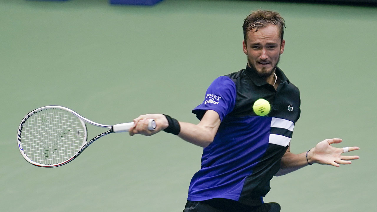 Daniil Medvedev, of Russia, returns a shot to Andrey Rublev, of Russia, during the quarterfinals of the US Open tennis championships. (Seth Wenig.AP)