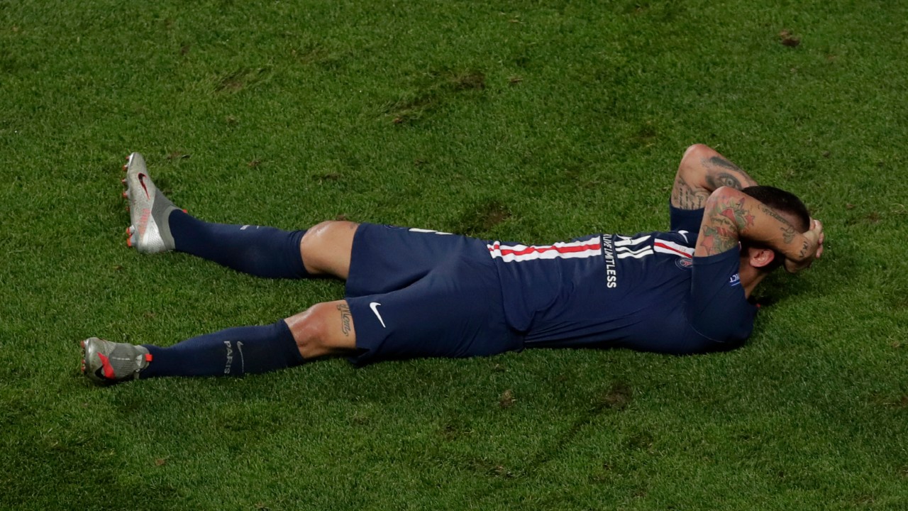 PSG's Marco Verratti lies on the ground after the Champions League final soccer match between Paris Saint-Germain and Bayern Munich at the Luz stadium in Lisbon, Portugal, Sunday, Aug. 23, 2020. (Manu Fernandez/Pool via AP)