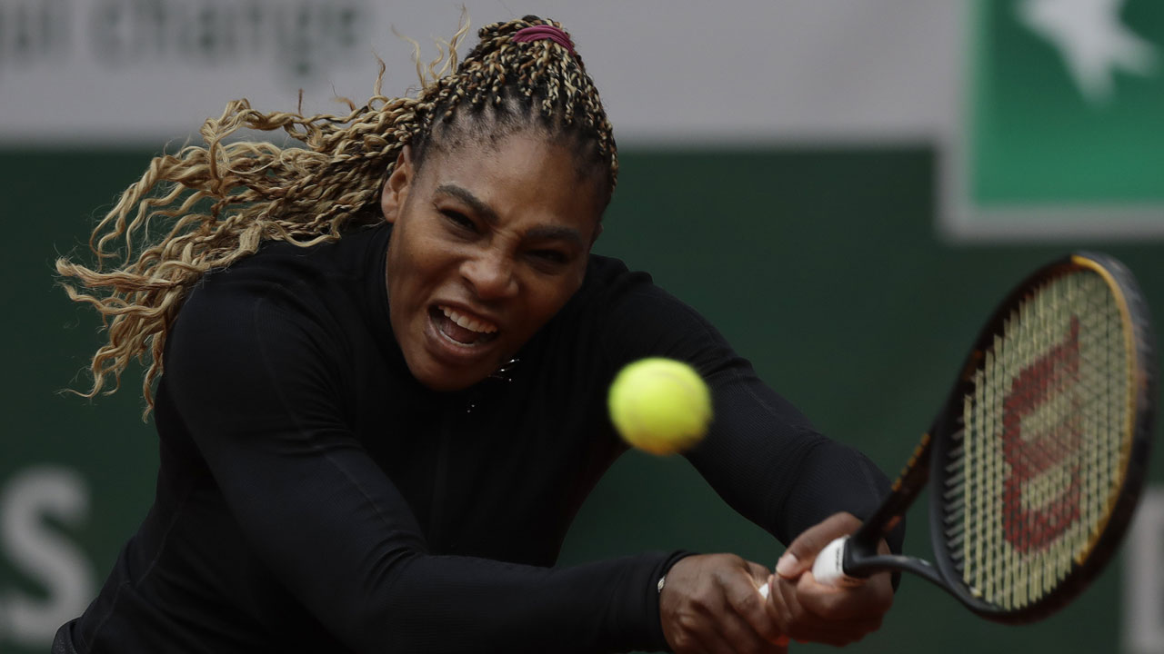 Serena Williams of the U.S. plays a shot against Kristie Ahn of the U.S. in the first round match of the French Open tennis tournament. (Alessandra Tarantino/AP))
