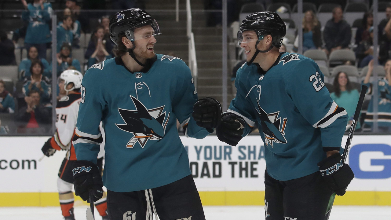 San Jose Sharks center Jonny Brodzinski, right, is congratulated by center Noah Gregor after scoring a goal against the Anaheim Ducks during the first period of an NHL preseason hockey game in San Jose, Calif., Tuesday, Sept. 17, 2019. (Jeff Chiu/AP)