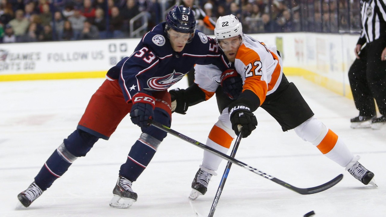 Columbus Blue Jackets defenceman Gabriel Carlsson, left, has signed a two-year contract with the team. (Jay LaPrete/AP)