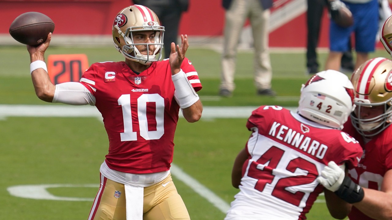 San Francisco 49ers quarterback Jimmy Garoppolo (10) passes against the Arizona Cardinals. (Tony Avelar/AP)