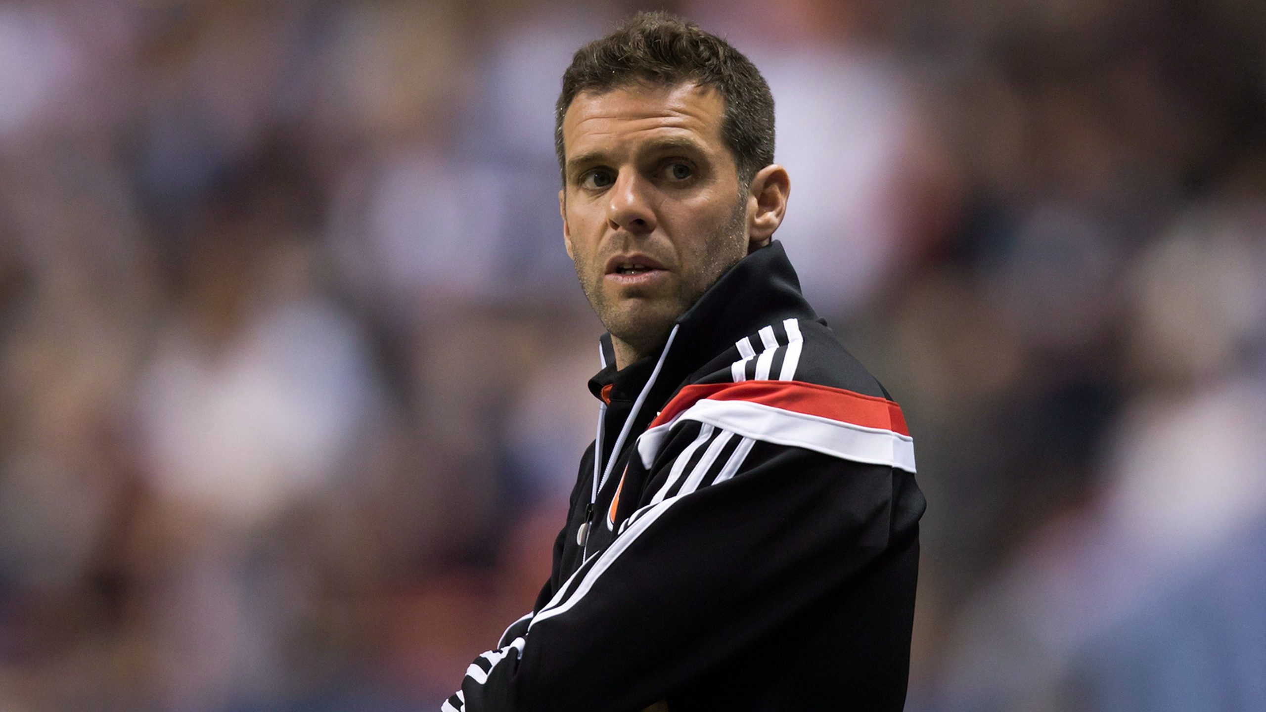 D.C. United head coach Ben Olsen watches from the sideline during the second half of an MLS soccer game against the Vancouver Whitecaps. (Darryl Dyck/CP)