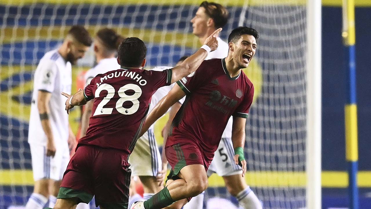 Raul Jimenez (R) celebrates after scoring for Wolves vs. Leeds. (Michael Regan/AP)
