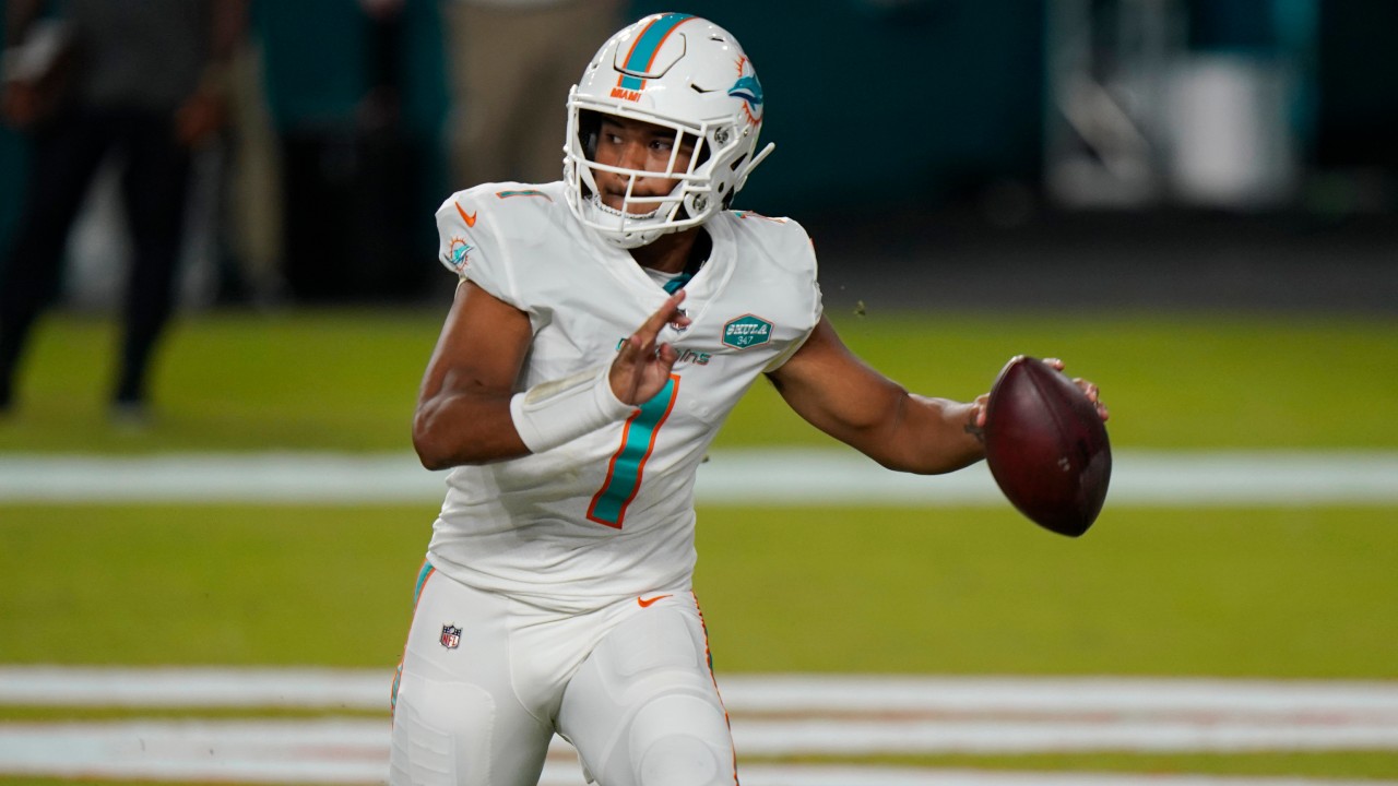 Miami Dolphins quarterback Tua Tagovailoa (1) looks to pass during the second half of an NFL football game against the New York Jets. (Lynne Sladky/AP)