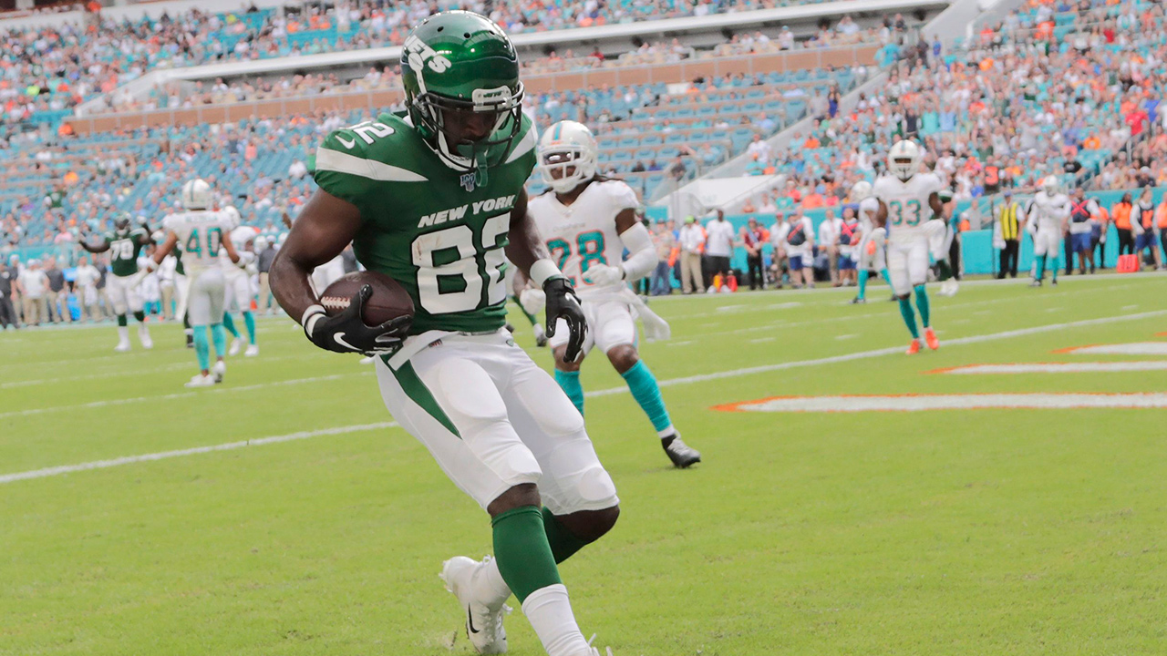 New York Jets wide receiver Jamison Crowder (82) runs the ball in for a touchdown against the Miami Dolphins during the first half, Sunday, Nov. 3, 2019, in Miami Gardens, Fla. (Lynne Sladky/AP)