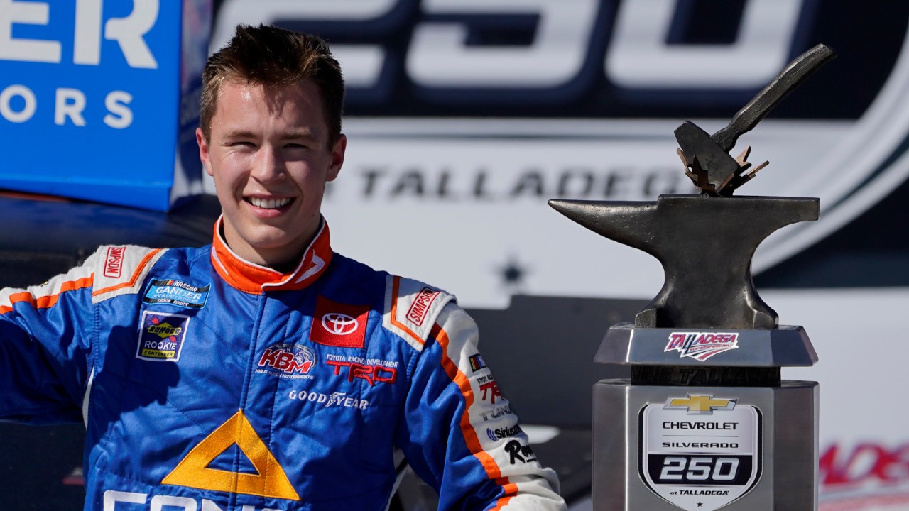 Raphael Lessard celebrates in Victory Lane after winning the NASCAR Truck series auto race at Talladega Superspeedway, Saturday, Oct. 3, 2020, in Talladega, Ala. (John Bazemore/AP)