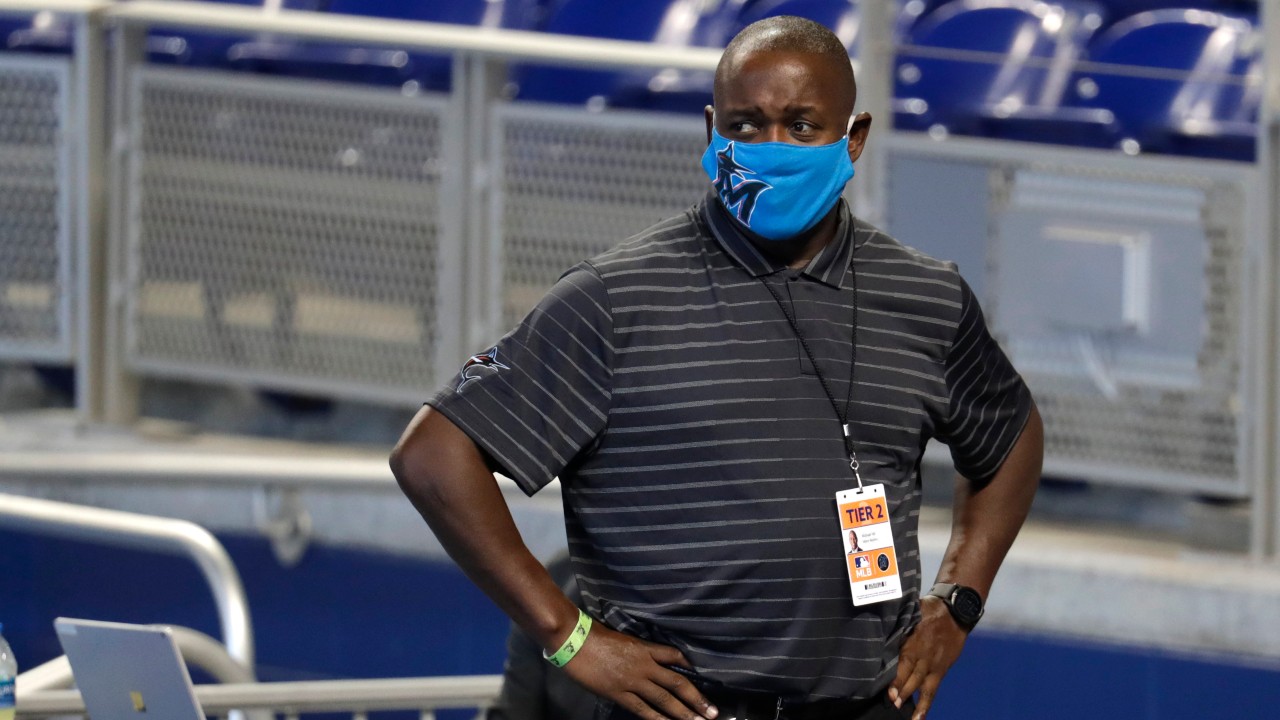 Former Miami Marlins president of baseball operations Michael Hill watches baseball practice at Marlins Park, Wednesday, July 8, 2020, in Miami. (AP Photo/Lynne Sladky)