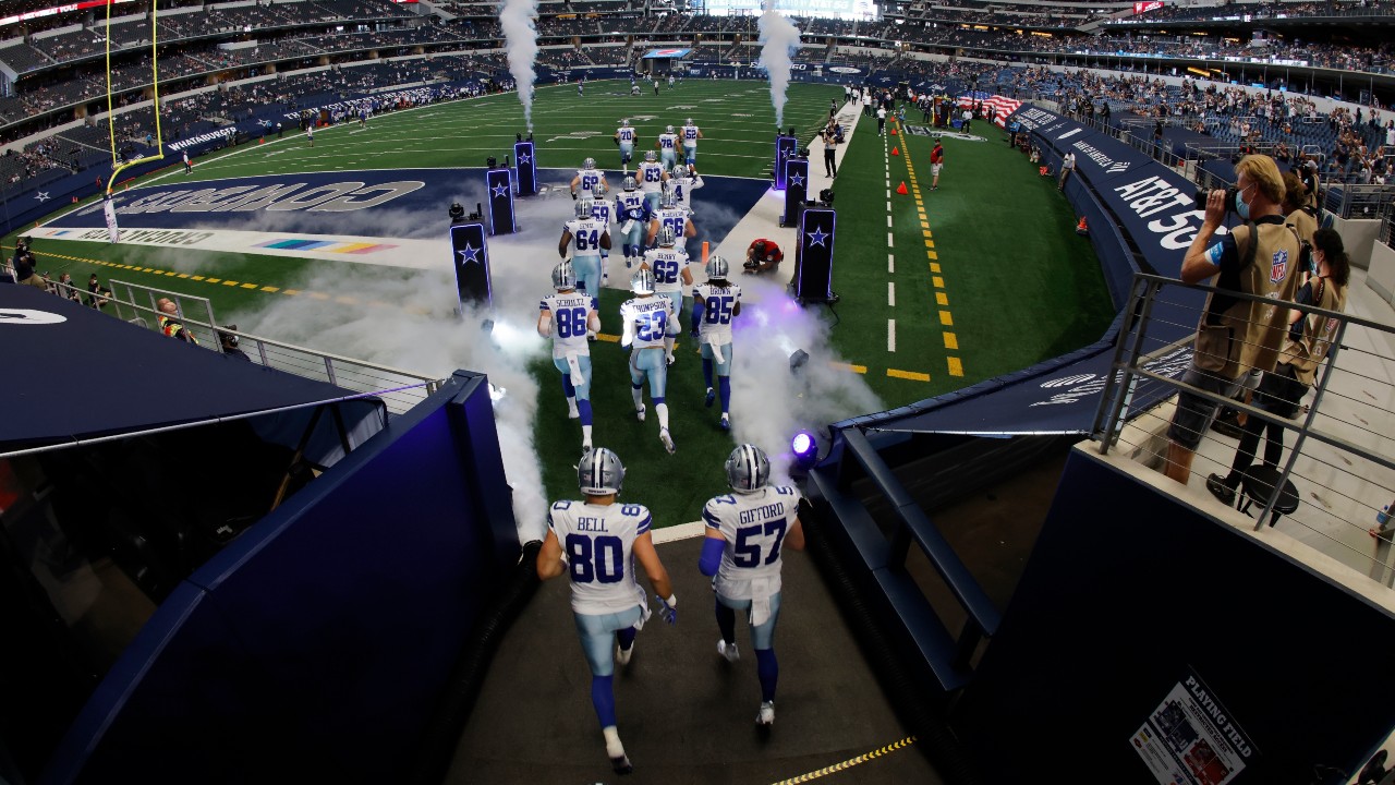 The Dallas Cowboys jog onto the field for the first half of an NFL football game against the New York Giants at AT&T Stadium in Arlington, Texas, Sunday, Oct. 11, 2020. (Ron Jenkins / AP)