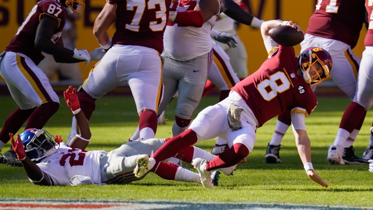 Washington Football Team quarterback Kyle Allen (8) injures his leg in a game against New York Giants. (Patrick Semansky/AP)