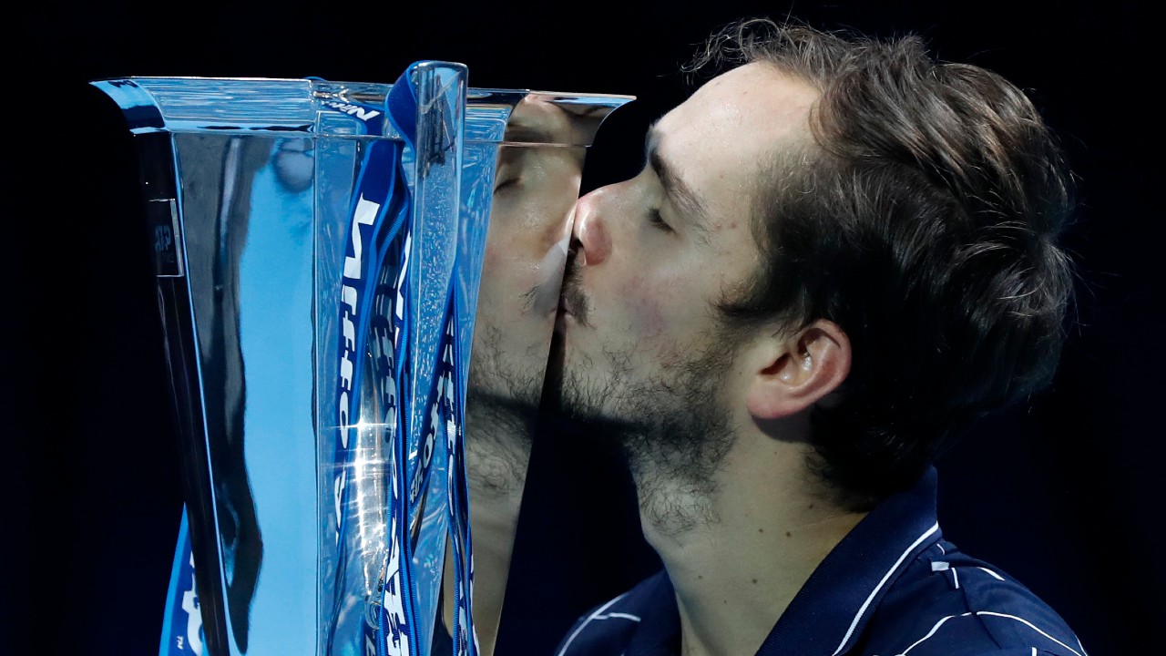Daniil Medvedev of Russia kisses the winners trophy after defeating Dominic Thiem of Austria in the final of the ATP World Finals tennis match. (Frank Augstein/AP)