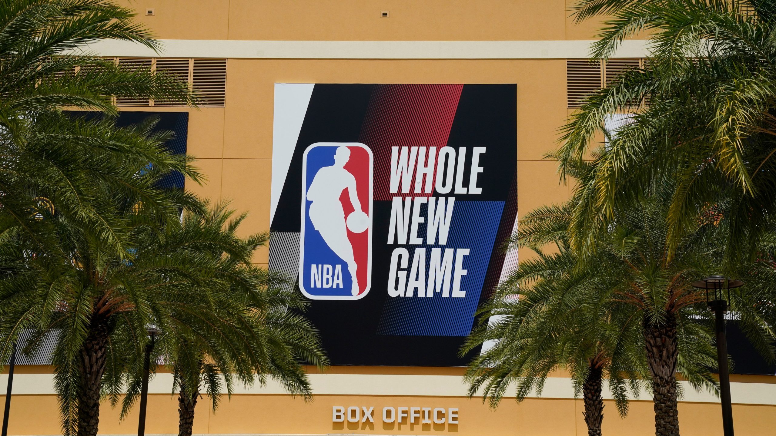 An NBA logo is displayed outside a basketball arena. (Ashley Landis, Pool, AP)