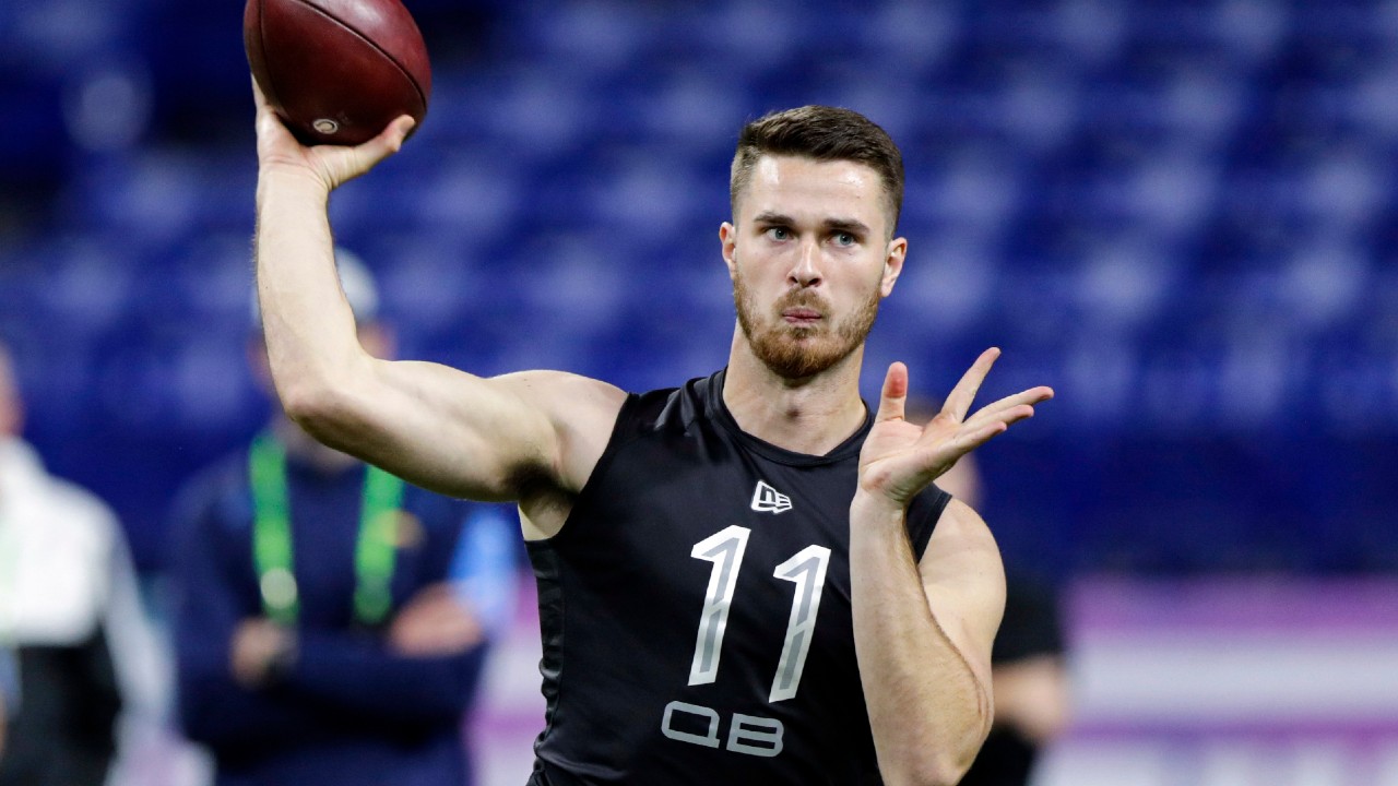 FILE - In this Feb. 27, 2020, file photo, Oregon State quarterback Jake Luton throws a pass at the NFL football scouting combine in Indianapolis.
(Michael Conroy/AP)
