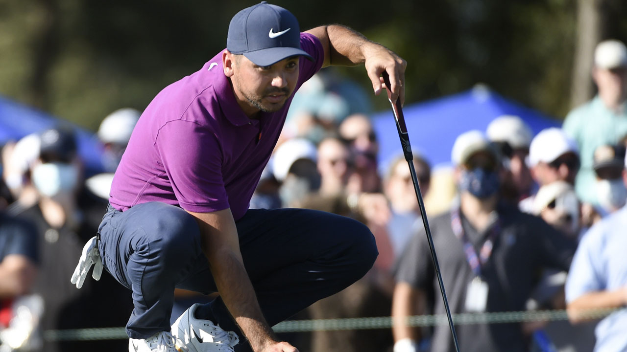 Jason Day lines up his putt on the 18th green during the third round of the Houston Open golf tournament. (Eric Christian Smith/AP)