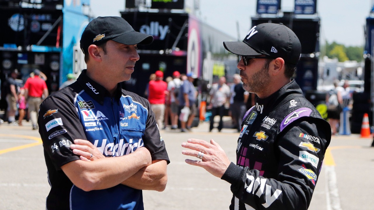 Crew chief Chad Knaus, left, talks with former teammate Jimmie Johnson before practice for a NASCAR cup series auto race at Michigan International Speedway, Friday, June 7, 2019, in Brooklyn, Mich. (Carlos Osorio/AP)