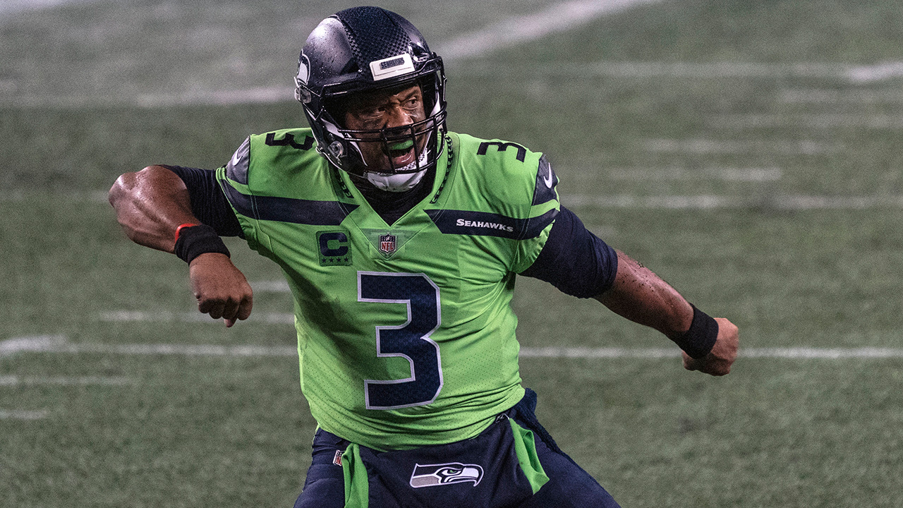 Seattle Seahawks quarterback Russell Wilson reacts after throwing a touchdown. (Stephen Brashear/AP)