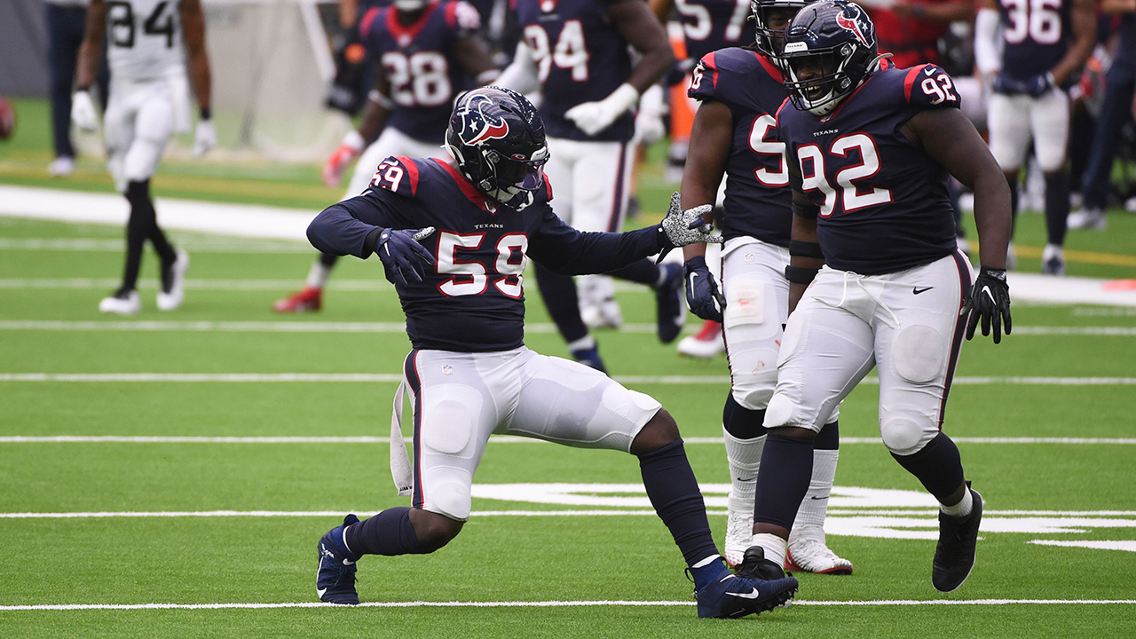 Houston Texans outside linebacker Whitney Mercilus (59) celebrates with teammates after the sacked Jacksonville Jaguars quarterback Gardner Minshew for a loss during the second half of an NFL football game Sunday, Oct. 11, 2020, in Houston. (Eric Christian Smith/AP)