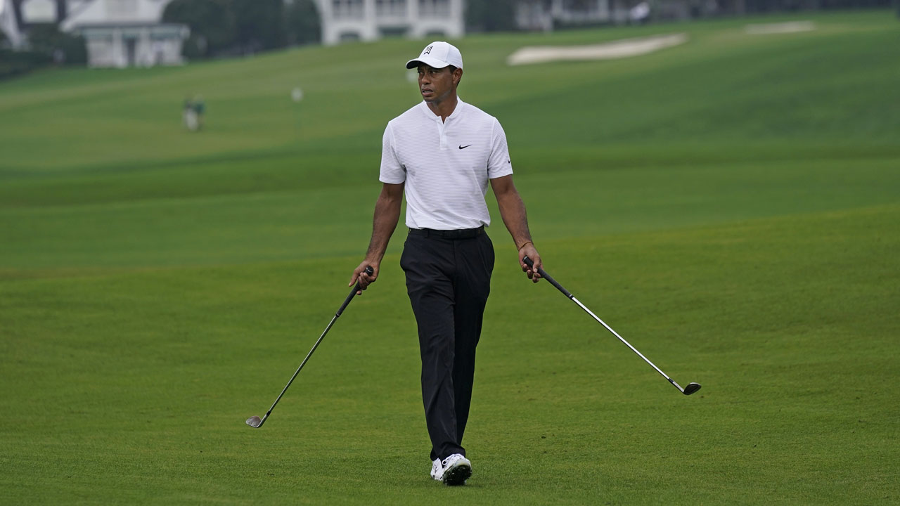 Tiger Woods walks to the second green during a practice round for the Masters golf tournament. (David J. Phillip/AP)