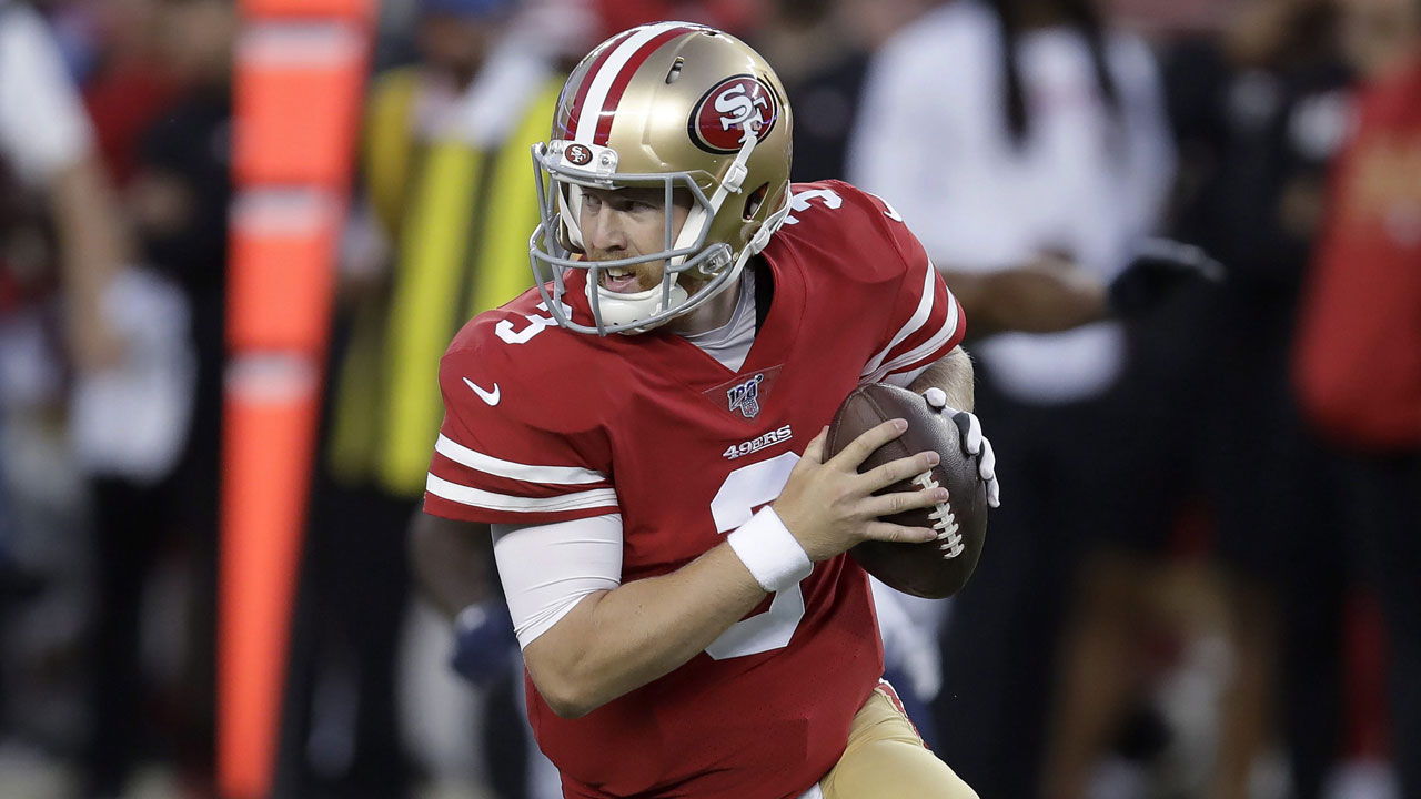 San Francisco 49ers quarterback C.J. Beathard rolls out to pass. (Ben Margot/AP)