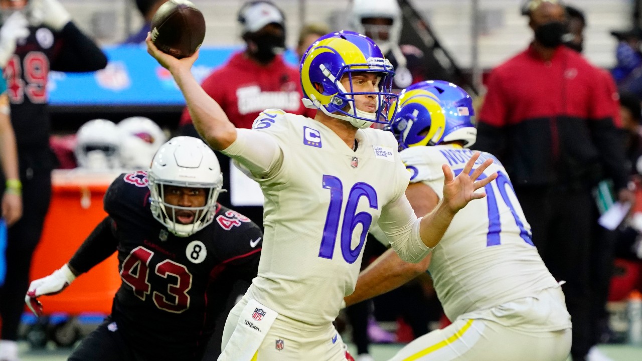 Los Angeles Rams quarterback Jared Goff (16) throws as Arizona Cardinals outside linebacker Haason Reddick (43) pursues during the first half of an NFL football game, Sunday, Dec. 6, 2020, in Glendale, Ariz. (Rick Scuteri/AP)