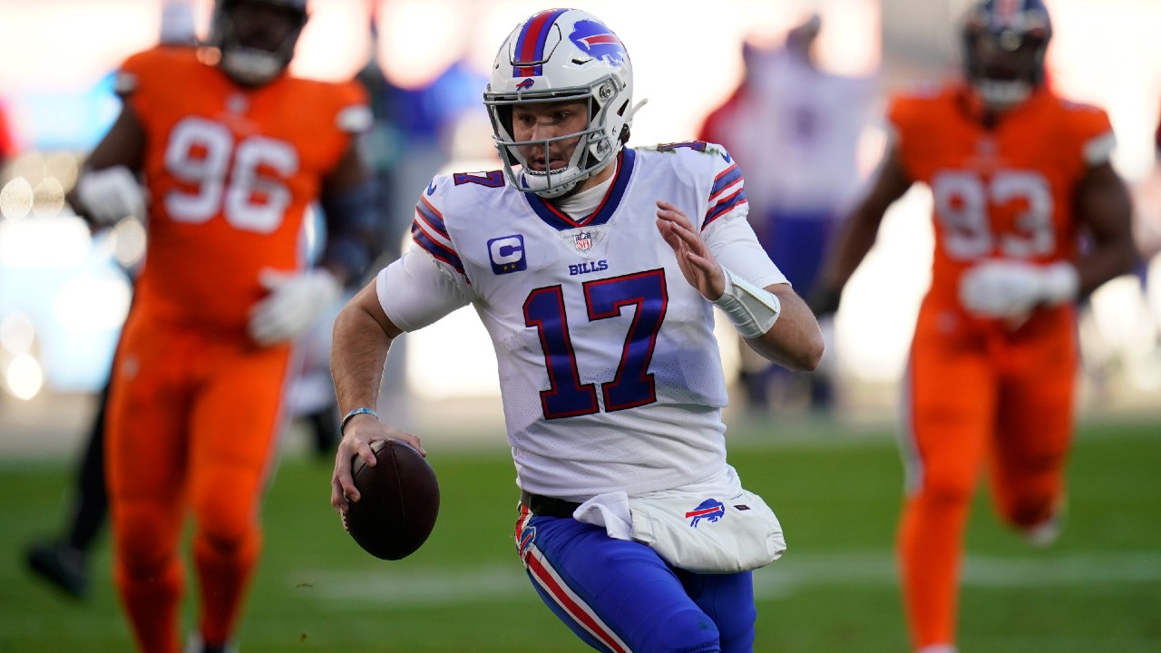 Buffalo Bills quarterback Josh Allen runs for a touchdown during the first half of an NFL football game against the Denver Broncos, Saturday, Dec. 19, 2020, in Denver. (Jack Dempsey/AP)