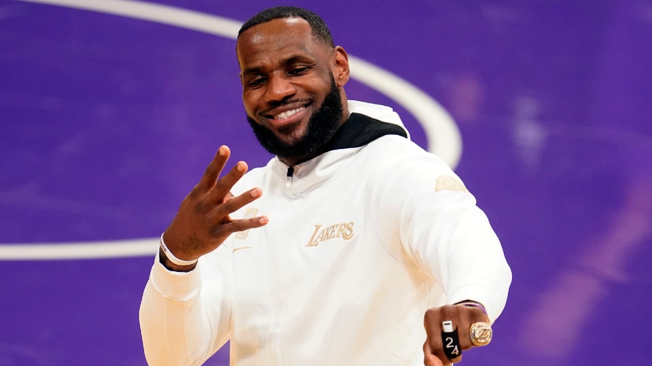 Los Angeles Lakers forward LeBron James reacts after receiving his NBA championship ring before an NBA basketball game against the Los Angeles Clippers, Tuesday, Dec. 22, 2020, in Los Angeles. (Marcio Jose Sanchez/AP)