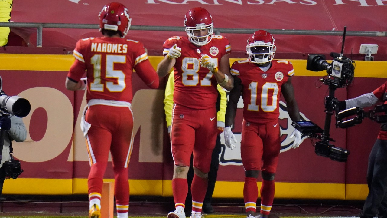 Kansas City Chiefs tight end Travis Kelce celebrates his 20-yard touchdown reception with Patrick Mahomes and Tyreek Hill on Sunday, Dec. 6, 2020. (Jeff Roberson / AP)
