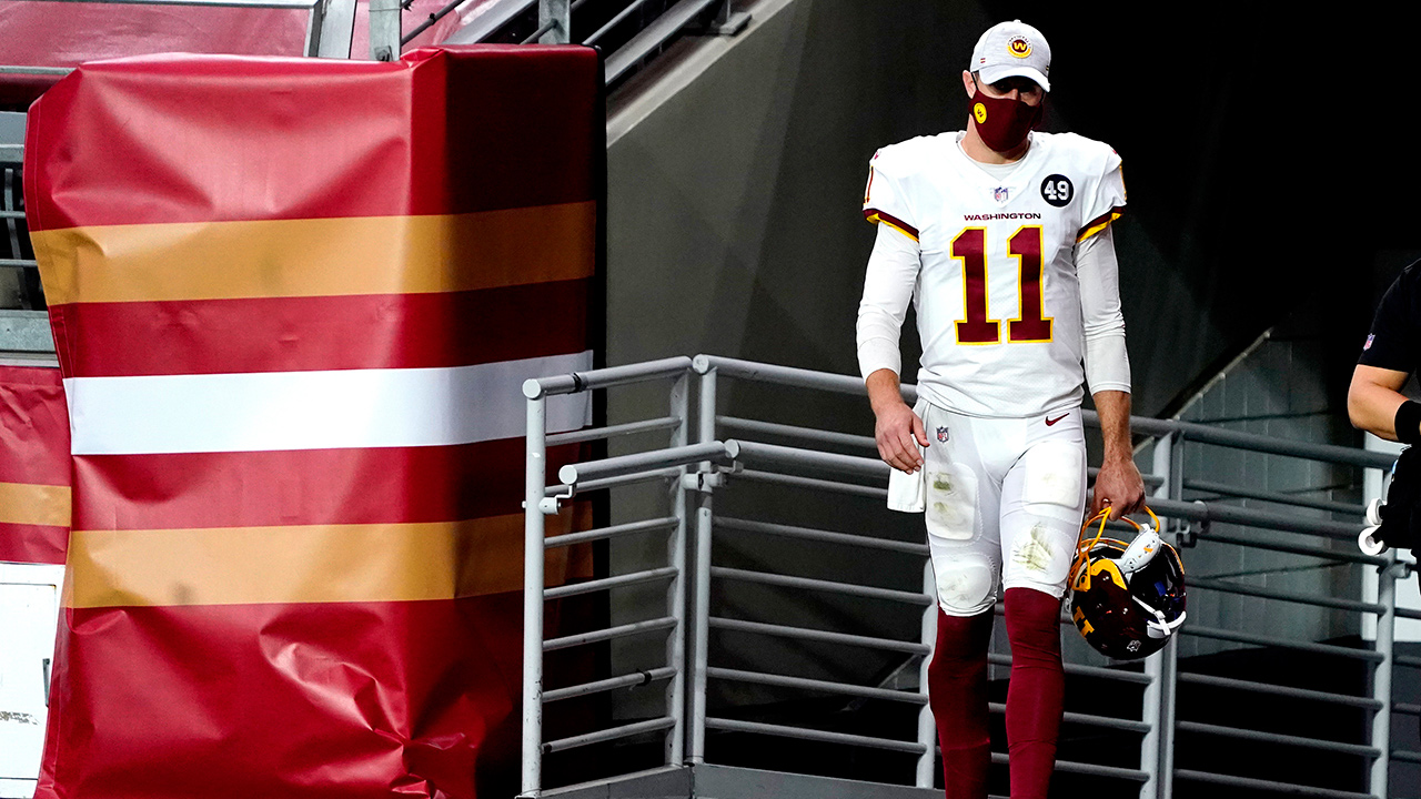 Washington Football Team quarterback Alex Smith (11) walks to the field for the start of the second half against the San Francisco 49ers, Sunday, Dec. 13, 2020, in Glendale, Ariz. (Rick Scuteri/AP)