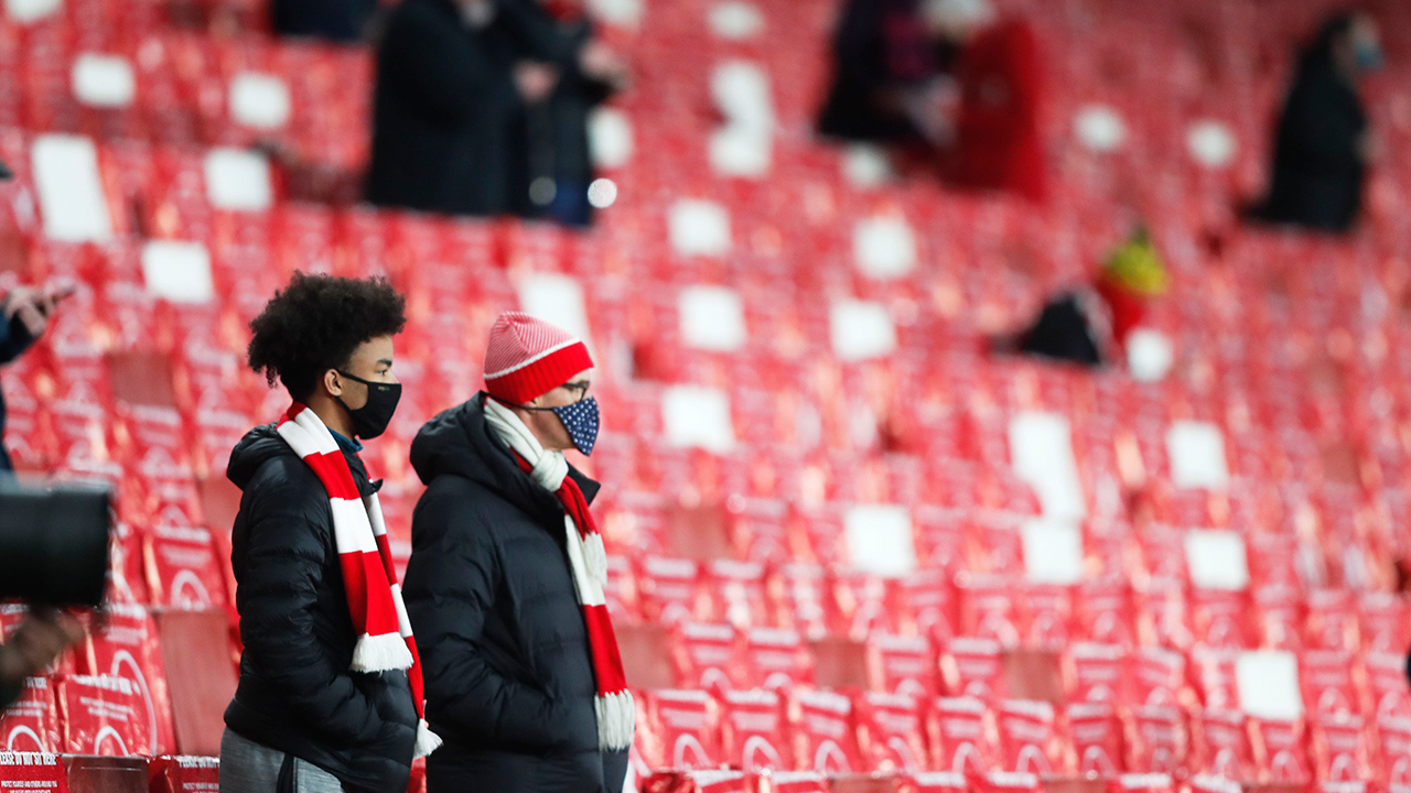 Soccer fans wait for the start of the Europa League group B soccer match between Arsenal and Rapid Wien at Emirates stadium in London, England, Thursday, Dec. 3, 2020 . (Frank Augstein/AP)