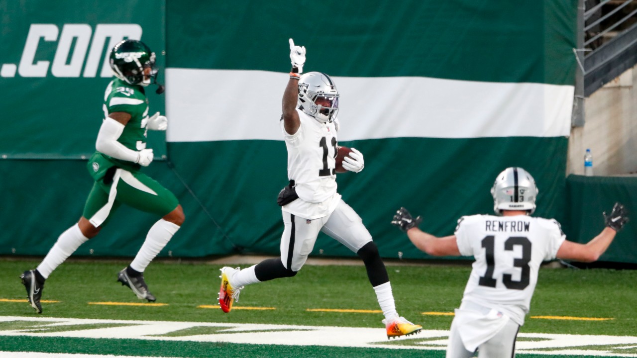 Las Vegas Raiders' Henry Ruggs III, center, celebrates his touchdown during the second half an NFL football game against the New York Jets, Sunday, Dec. 6, 2020, in East Rutherford, N.J. (AP Photo/Noah K. Murray)