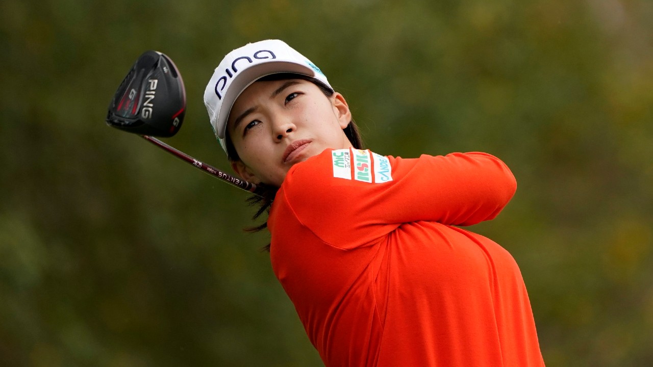 Hinako Shibuno, of Japan, follows through on her drive off the 18th tee during the second round of the U.S. Women's Open golf tournament in Houston, Friday, Dec. 11, 2020. (Eric Gay/AP)