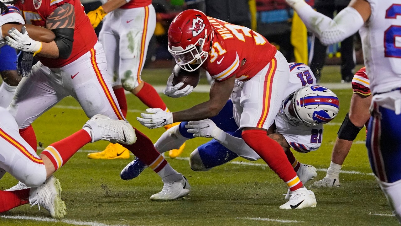 Kansas City Chiefs running back Darrel Williams (31) breaks a tackle by Buffalo Bills safety Jordan Poyer (21) during a 6-yard touchdown run in the first half of the AFC championship NFL football game, Sunday, Jan. 24, 2021, in Kansas City, Mo. (Jeff Roberson/AP)