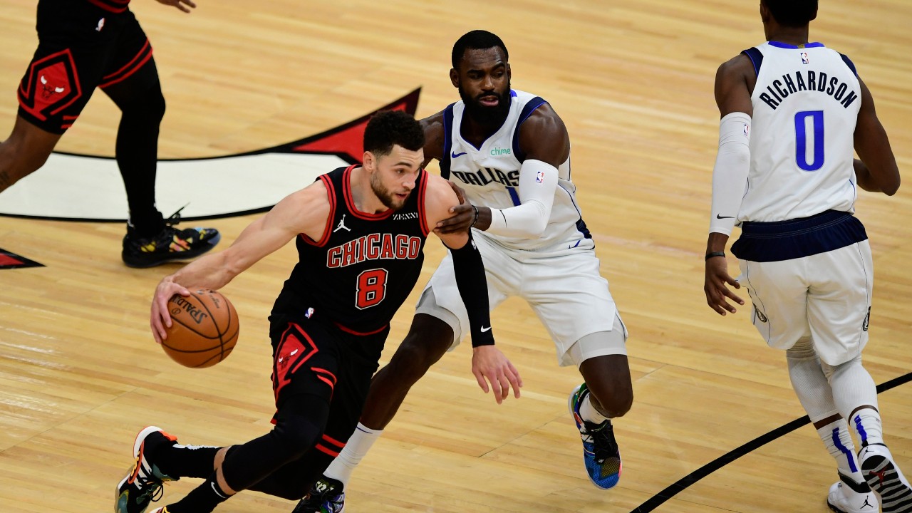 Chicago Bulls' Zach LaVine (8) drives against Dallas Mavericks' Tim Hardaway Jr. (11) during the first half of an NBA basketball game. (Paul Beaty/AP)