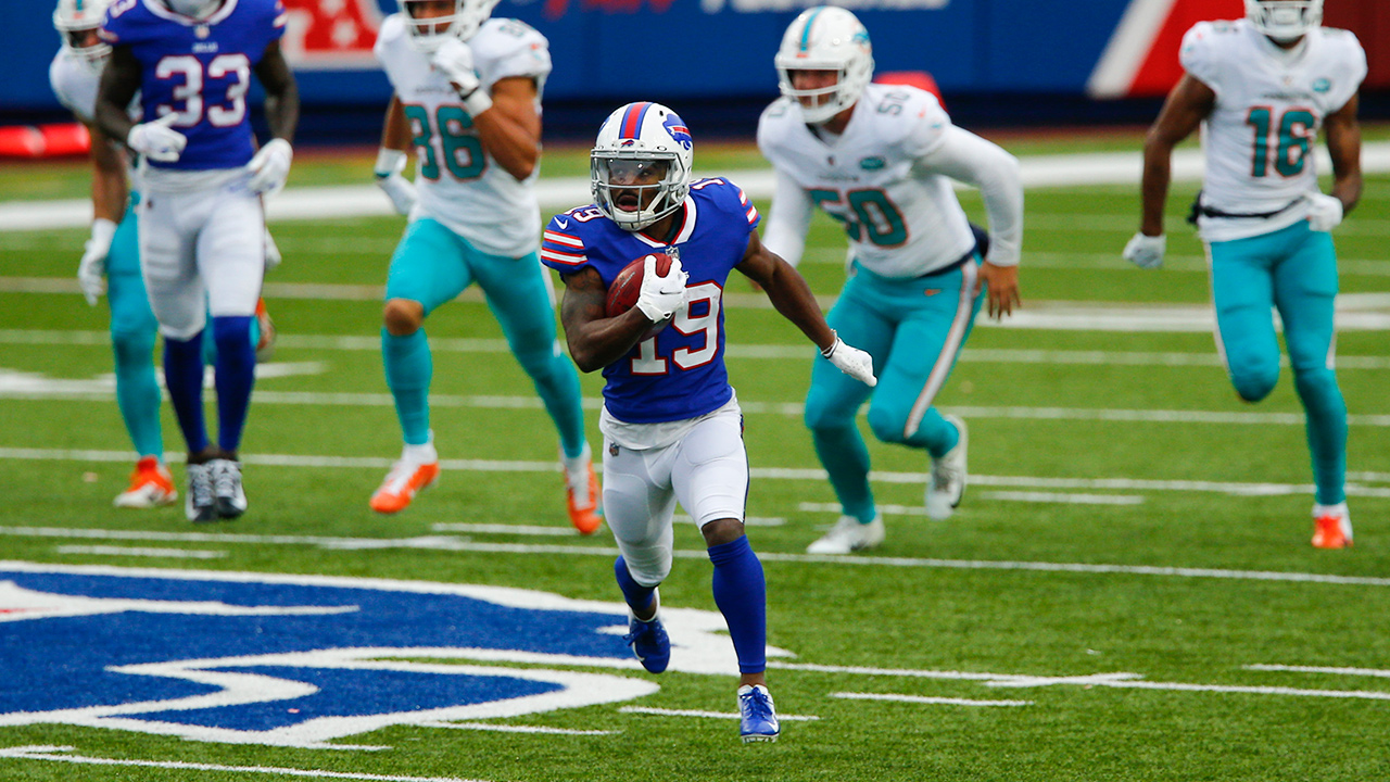 Buffalo Bills wide receiver Isaiah McKenzie (19) runs for a touchdown after catching a short pass in the first half against the Miami Dolphins. (John Munson/AP)