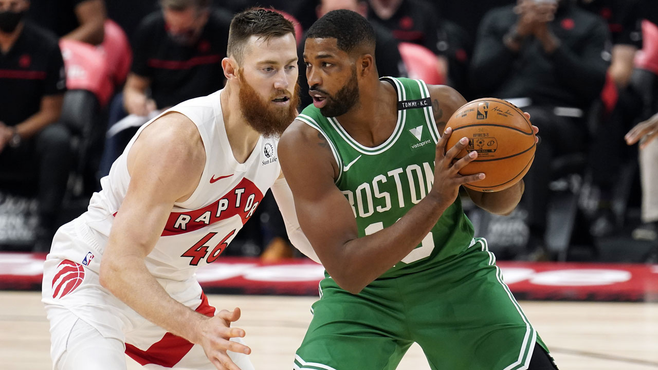 Boston Celtics center Tristan Thompson (13) drives against Toronto Raptors center Aron Baynes (46) during the first half of an NBA basketball game. (Chris O'Meara/AP)