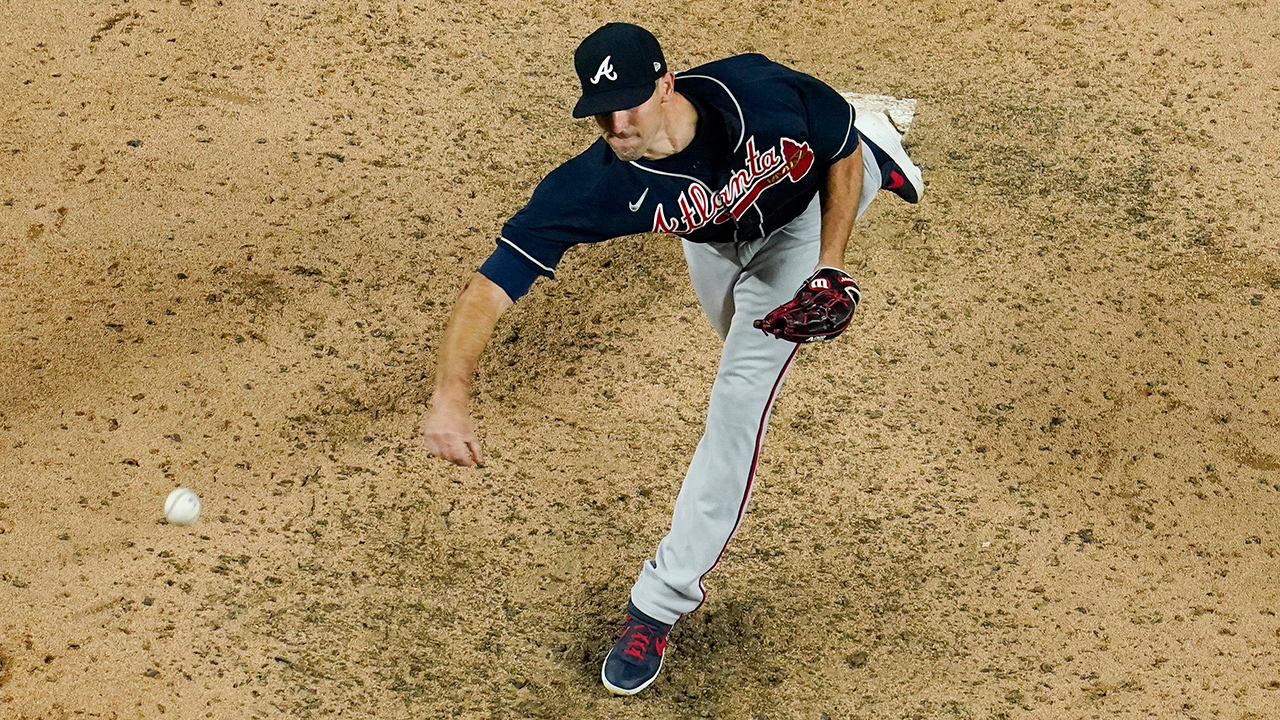 Atlanta Braves relief pitcher Darren O'Day throws against the Los Angeles Dodgers during the seventh inning in Game 2 of a baseball National League Championship Series Tuesday, Oct. 13, 2020, in Arlington, Texas. (David J. Phillip/AP)