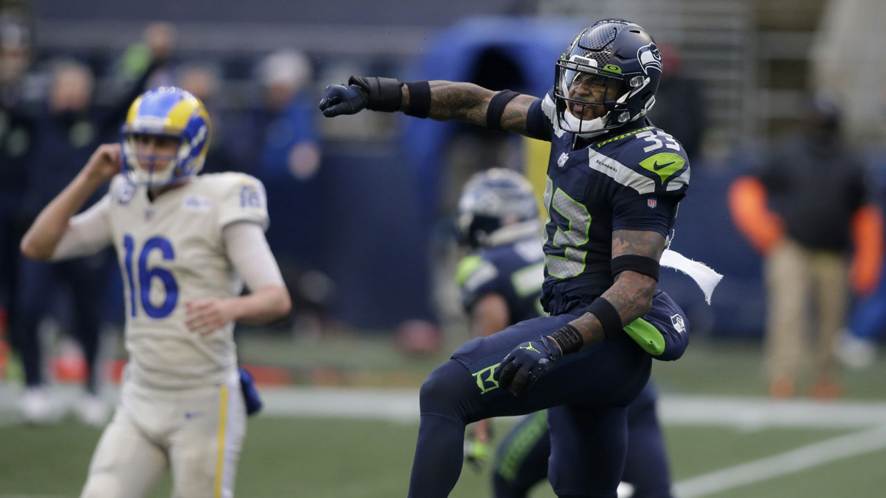 Seattle Seahawks strong safety Jamal Adams (33) reacts to a play with Los Angeles Rams quarterback Jared Goff (16) in the background, during the second half of an NFL football game. (Scott Eklund/AP)