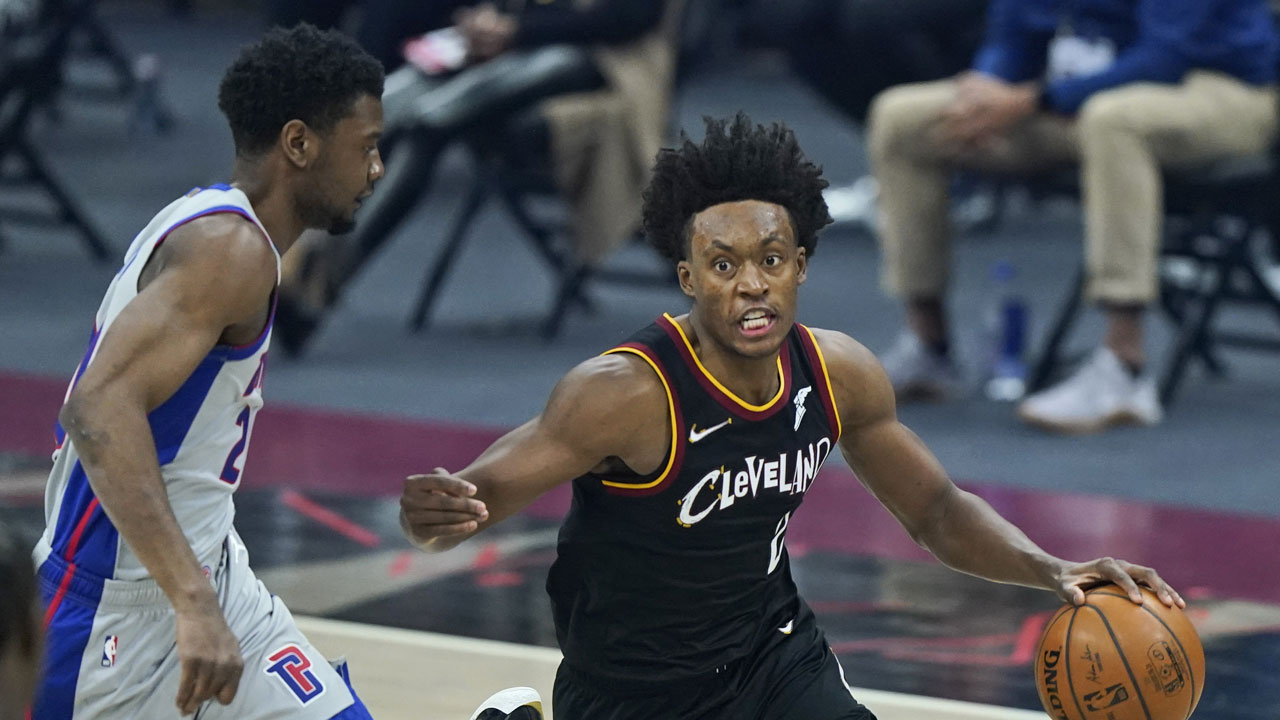 Cleveland Cavaliers' Collin Sexton, right, drives past Detroit Pistons' Josh Jackson in the first half of an NBA basketball game. (Tony Dejak/AP)