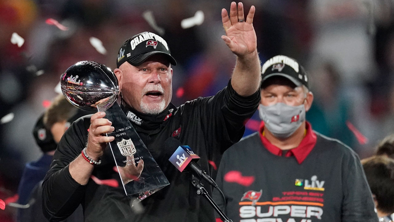 Tampa Bay Buccaneers head coach Bruce Arians holds up the Vince Lombardi trophy. (Ashley Landis/AP)