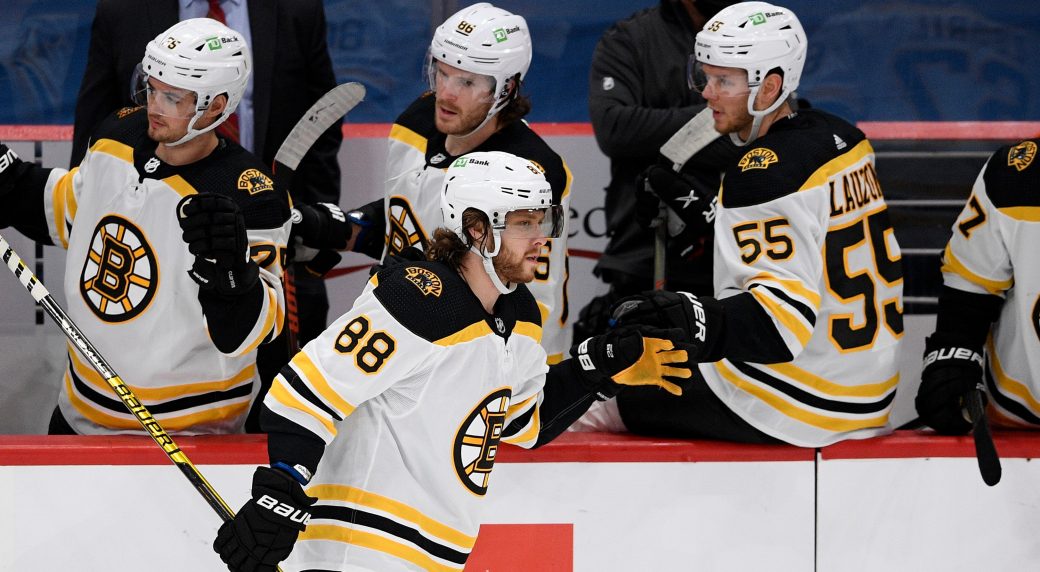 Bruins erase three-goal deficit to win against Cap