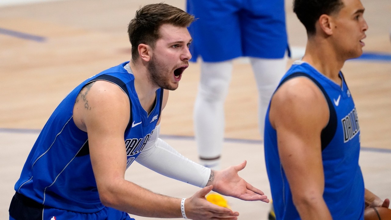 Dallas Mavericks' Luka Doncic (77) gestures at an official after being called for a foul during the second half of the team's NBA basketball game against the Golden State Warriors. (Tony Gutierrez/AP)
