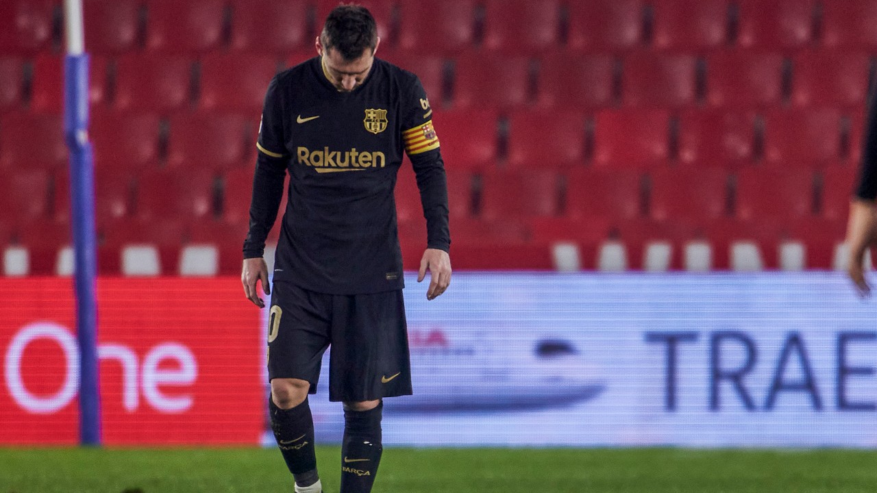 Barcelona's Lionel Messi reacts during a Spanish Copa del Rey quarter finals soccer match between Granada and FC Barcelona at the Los Carmenes stadium in Granada, Spain, Wednesday, Feb. 3, 2021. (AP)