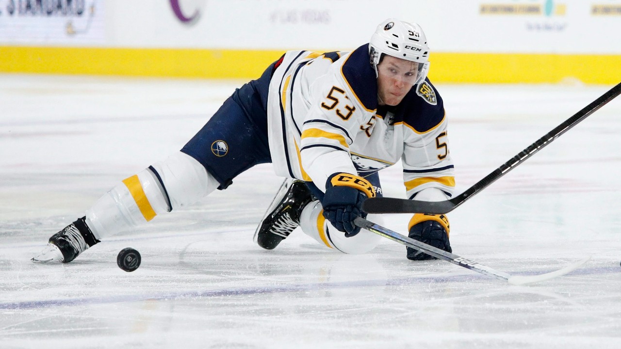 Buffalo Sabres left wing Jeff Skinner (53) dives for the puck against the Vegas Golden Knights during the third period of an NHL hockey game. (John Locher/AP)