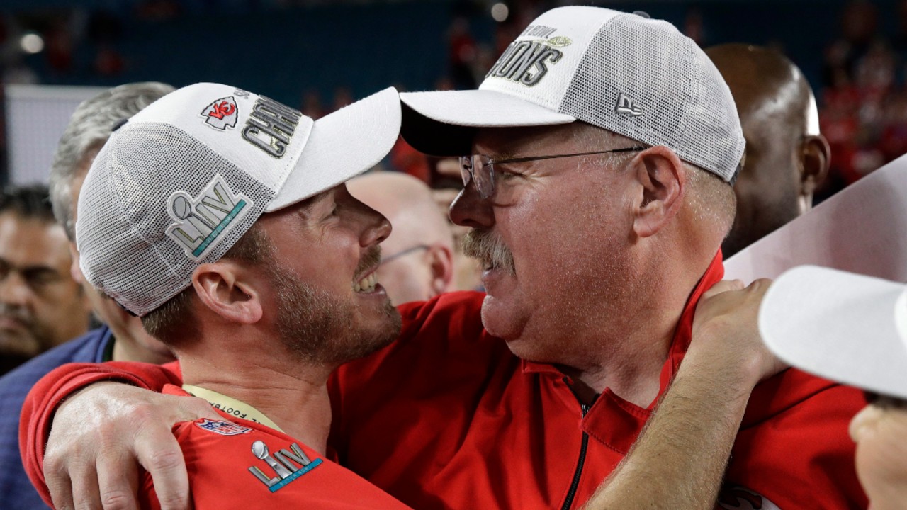 Kansas City Chiefs head coach Andy Reid, right, embraces his son Britt. (Patrick Semansky/AP)