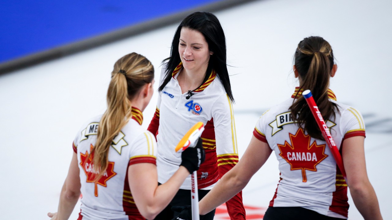 Team Canada skip Kerri Einarson, centre, celebrates a shot with teammates against Team Ontario in the final at the Scotties Tournament of Hearts in Calgary, Alta., Sunday, Feb. 28, 2021.THE CANADIAN PRESS/Jeff McIntosh