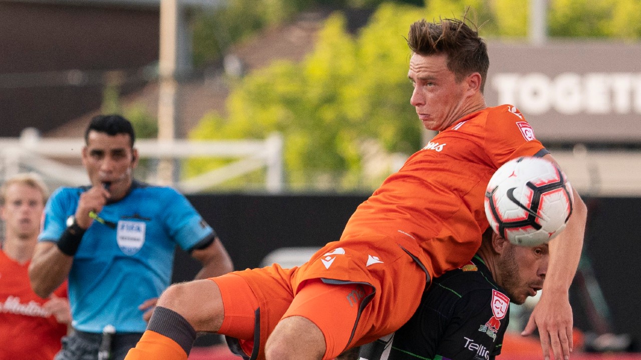 Hamilton Forge FC's Daniel Krutzen (5) grimaces while vying for possession against Antigua FC's Anllei Porras (9) during first-half Scotiabank CONCACAF League soccer action in Hamilton, Ont., Thursday, Aug. 1, 2019. (Peter Power/CP)