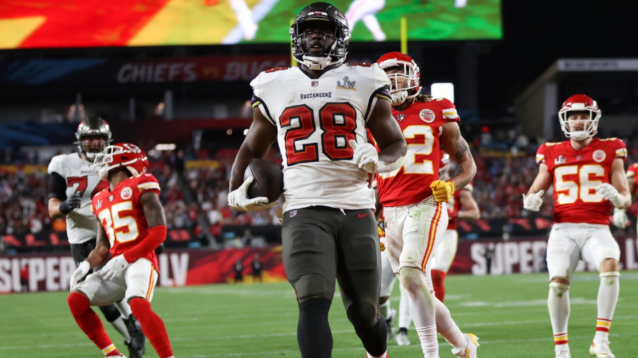 Tampa Bay Buccaneers running back Leonard Fournette (28) carries the ball for a touchdown during the NFL Super Bowl 55 football game against the Kansas City Chiefs, Sunday, Feb. 7, 2021, in Tampa, Fla. (Ben Liebenberg via AP)