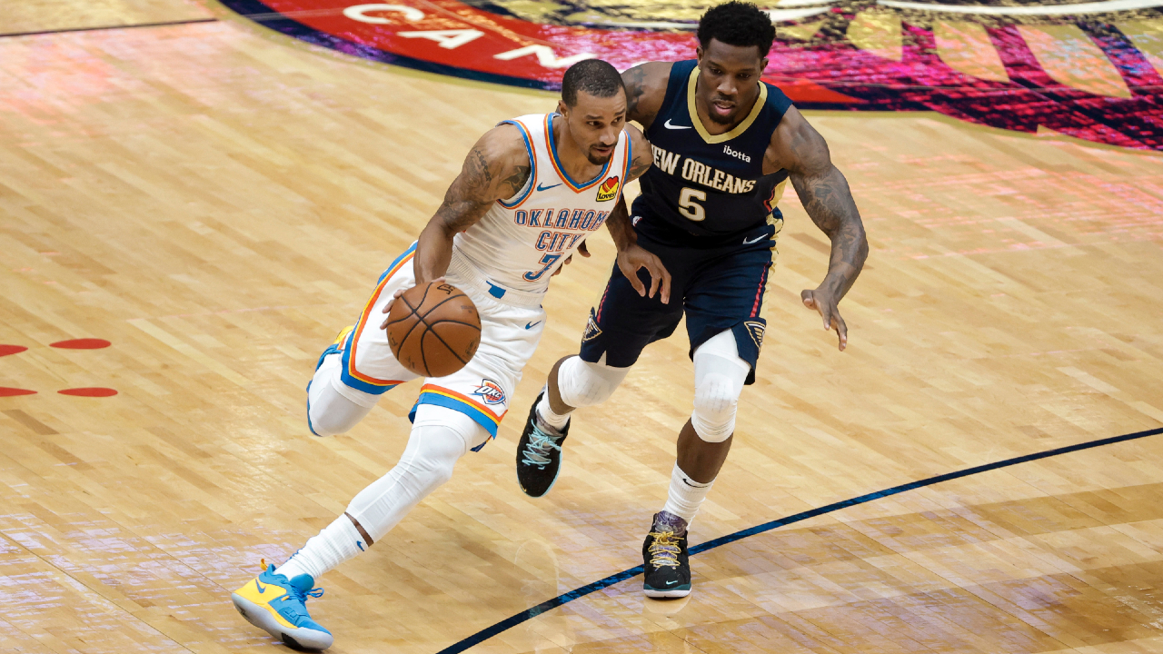 Oklahoma City Thunder guard George Hill (3) drives past New Orleans Pelicans guard Eric Bledsoe (5) in the first quarter of an NBA basketball game in New Orleans, Wednesday, Jan. 6, 2021. (Derick Hingle/AP)